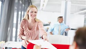 Girl handing over CV to future proof career